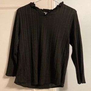 Black cotton top with small ruffle detail around the neck